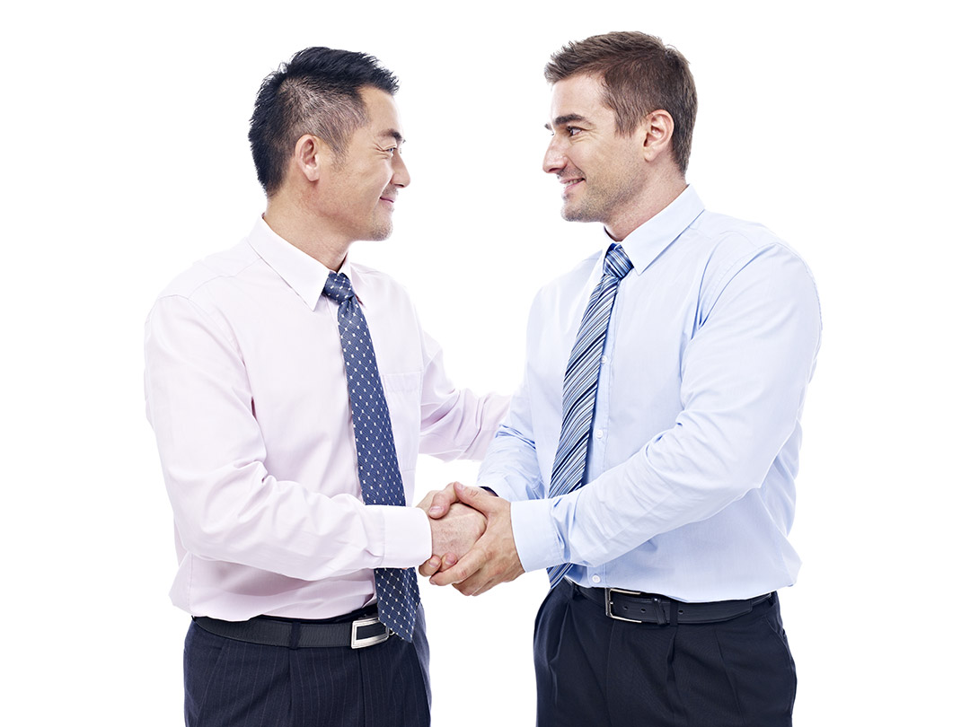 shaking hands businessmen